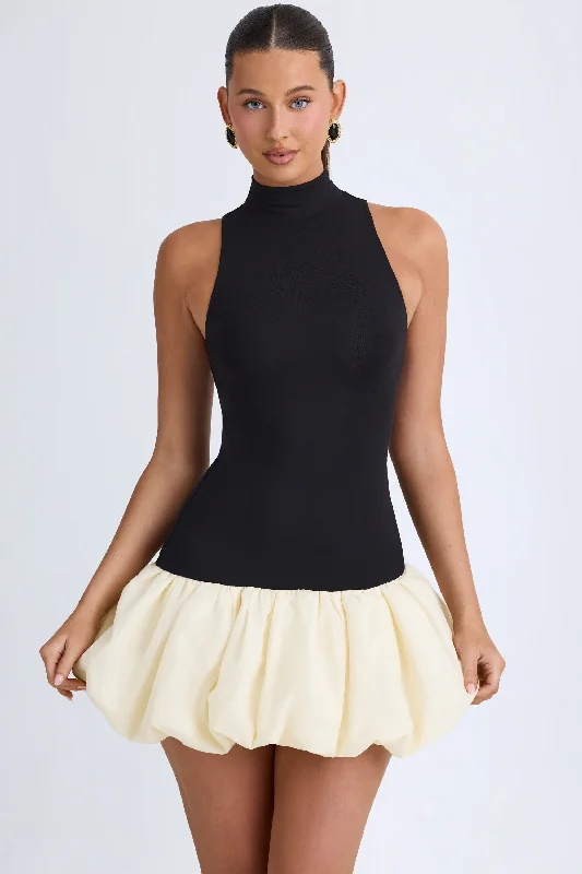Animal print mini dresses for a bold statement Turtleneck Drop-Waist Bubble Hem Mini Dress in Black Animal print mini dresses for a bold statement Turtleneck Drop-Waist Bubble Hem Mini Dress in Black