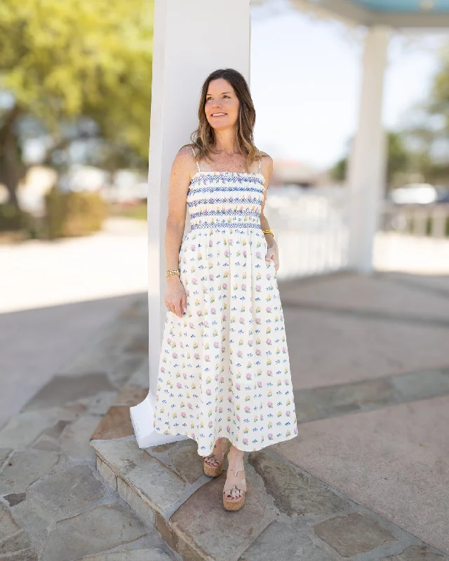 A - line midi dresses with floral prints for spring brunches Floral Smocked Midi Dress A - line midi dresses with floral prints for spring brunches Floral Smocked Midi Dress