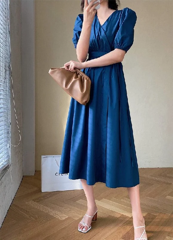 Midi dresses with embroidered accents for a unique and detailed design Puff Sleeve Wrap Midi Dress Midi dresses with embroidered accents for a unique and detailed design Puff Sleeve Wrap Midi Dress