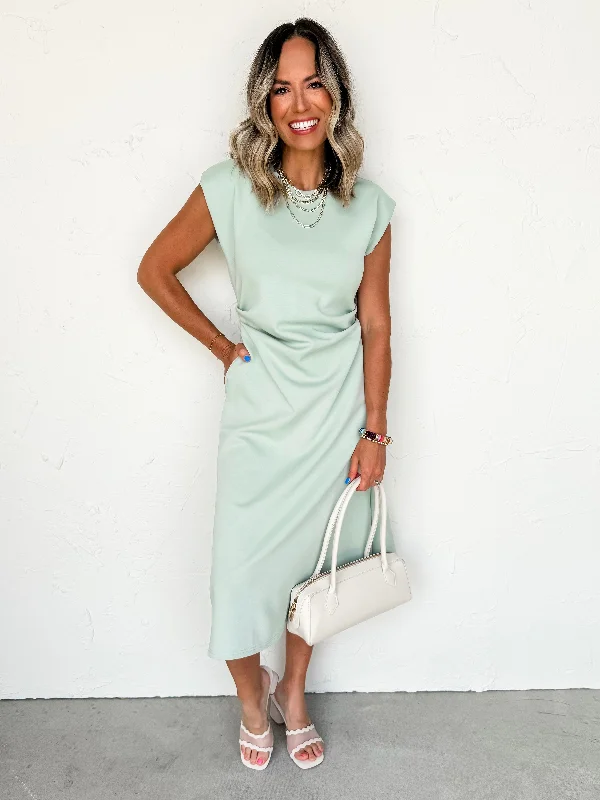 Midi dresses with ruffled sleeves for a more feminine and voluminous look The Sleek Minimalist Neoprene Side Pleat Midi Dress Midi dresses with ruffled sleeves for a more feminine and voluminous look The Sleek Minimalist Neoprene Side Pleat Midi Dress