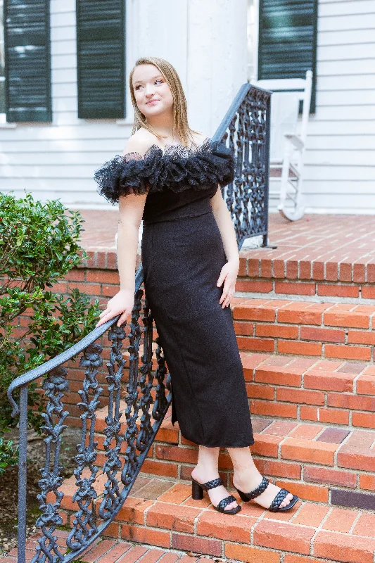 Midi dresses with geometric cutouts for a contemporary and edgy look Off-the-Shoulder Black Midi Dress by Entro Clothing Midi dresses with geometric cutouts for a contemporary and edgy look Off-the-Shoulder Black Midi Dress by Entro Clothing