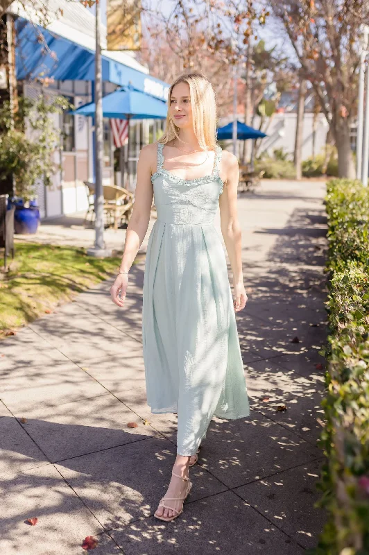 Midi dresses with asymmetric hems for a fashion - forward and dynamic appearance Mckayla Sleeveless Ruffle Trim Midi Dress Mint Midi dresses with asymmetric hems for a fashion - forward and dynamic appearance Mckayla Sleeveless Ruffle Trim Midi Dress Mint