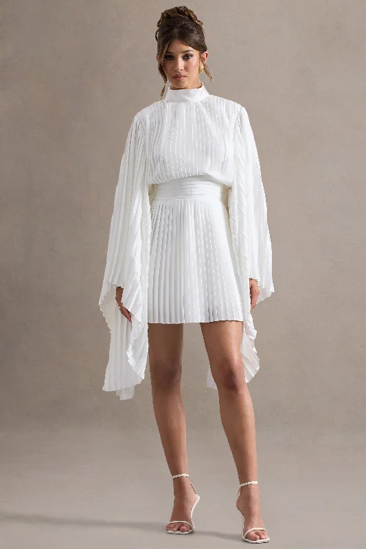 Mini dresses with embroidered details for a unique touch Charity | White Pleated High-Neck Mini Dress With Cape Sleeves Mini dresses with embroidered details for a unique touch Charity | White Pleated High-Neck Mini Dress With Cape Sleeves