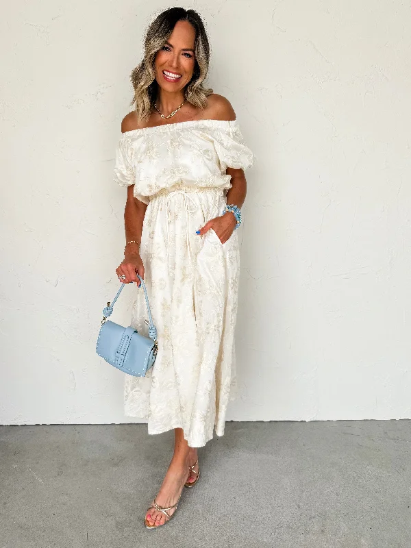 Midi dresses with ruffled sleeves for a more feminine and voluminous look Dreams of Spring Gathered Neck Bubble Sleeve Midi Dress Midi dresses with ruffled sleeves for a more feminine and voluminous look Dreams of Spring Gathered Neck Bubble Sleeve Midi Dress