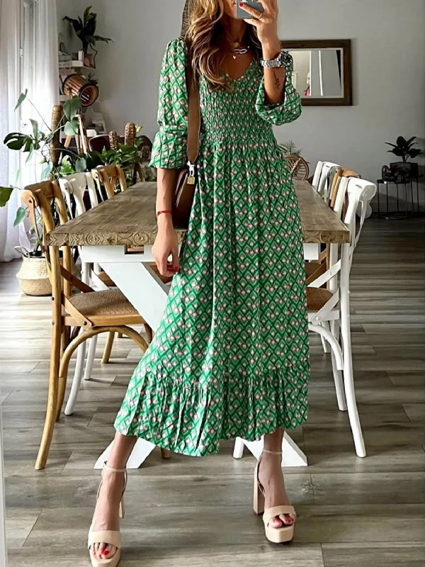 Midi dresses with wrap - around skirts for a customizable fitSmocked Printed V-Neck Midi Dress Midi dresses with wrap - around skirts for a customizable fitSmocked Printed V-Neck Midi Dress