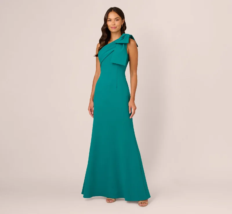 Maxi dresses with cold - shoulder cutouts for a trendy lookStretch Crepe One Shoulder Mermaid Gown With Bow Accent In Tempo Teal Maxi dresses with cold - shoulder cutouts for a trendy lookStretch Crepe One Shoulder Mermaid Gown With Bow Accent In Tempo Teal